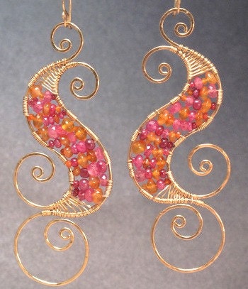 Luxe Bijoux 128 Hammered swirl shapes wrapped with ruby and carnelian
