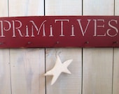 Primitives Sign with Square Nail Pegs