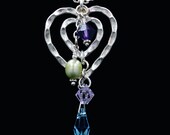 Sterling silver heart pendant with amethyst crystals and pastel freshwater pearls.