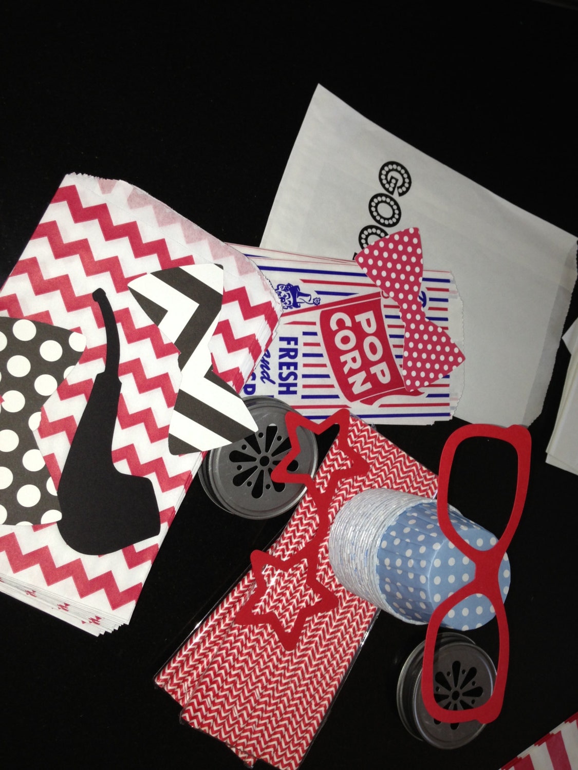 15 Aqua candy cups, 50 Red chevron straws, 15 Photo Props to include Mommy Daddy Glasses