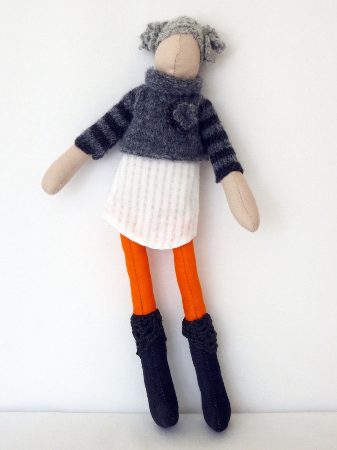 Handmade fabric doll, knitted corsage jumper and lace trimmed boots