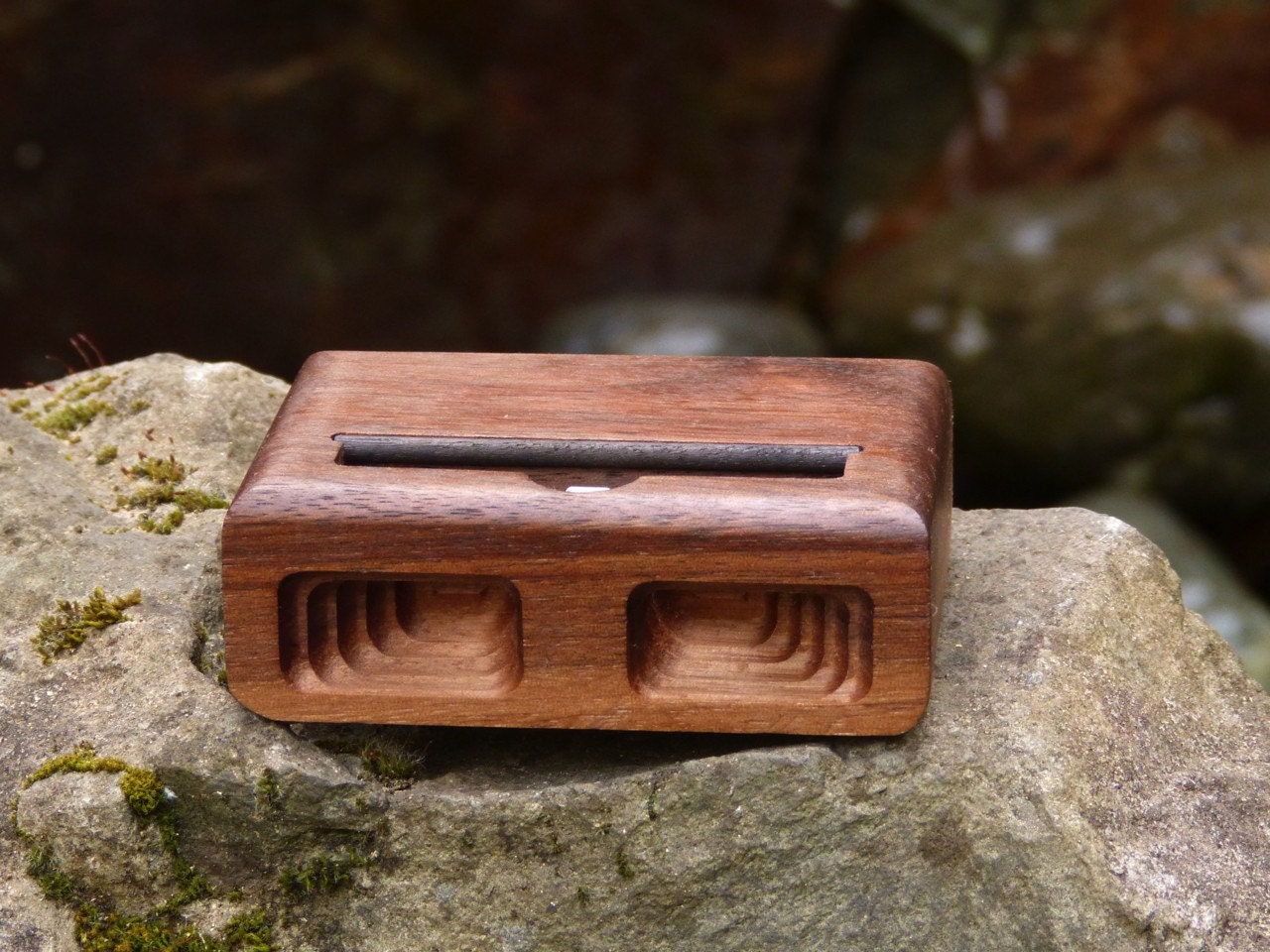 Acoustic dock  for iPhone 5 in Walnut  - Amplifies sound naturally through unique acoustical pockets .
