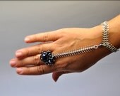 A sensual ring bracelet, silver plated fish bone chain, and gunmetal crystals and glass beads