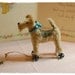 Pipe Cleaner    Airedale terrier on wheels
