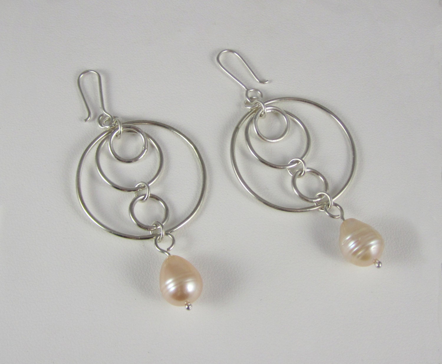 Sterling silver loop earrings with pearls