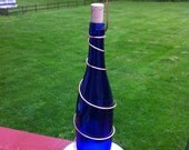 Blue Glass Wine Bottle Bird Feeded