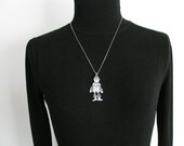 vintage antique sterling silver mechanical clown pendant. triangle design. ALWAYS HAPPY.