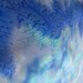 Waterscape design creates a pool of blue shades on silk