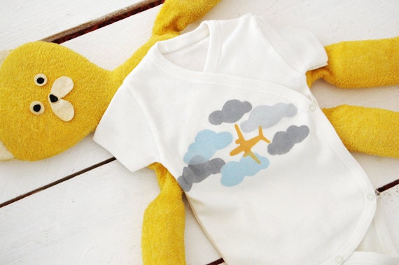 Organic bodiesuit with airplane and clouds