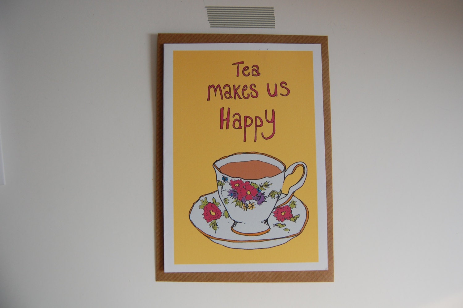 Floral vintage tea cup 'Tea makes us happy' card