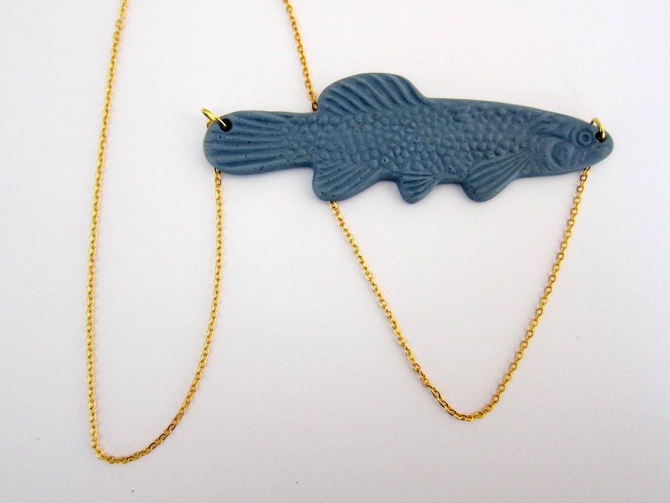 necklace with little blue/grey fish pendant in ceramic/porcelain/china