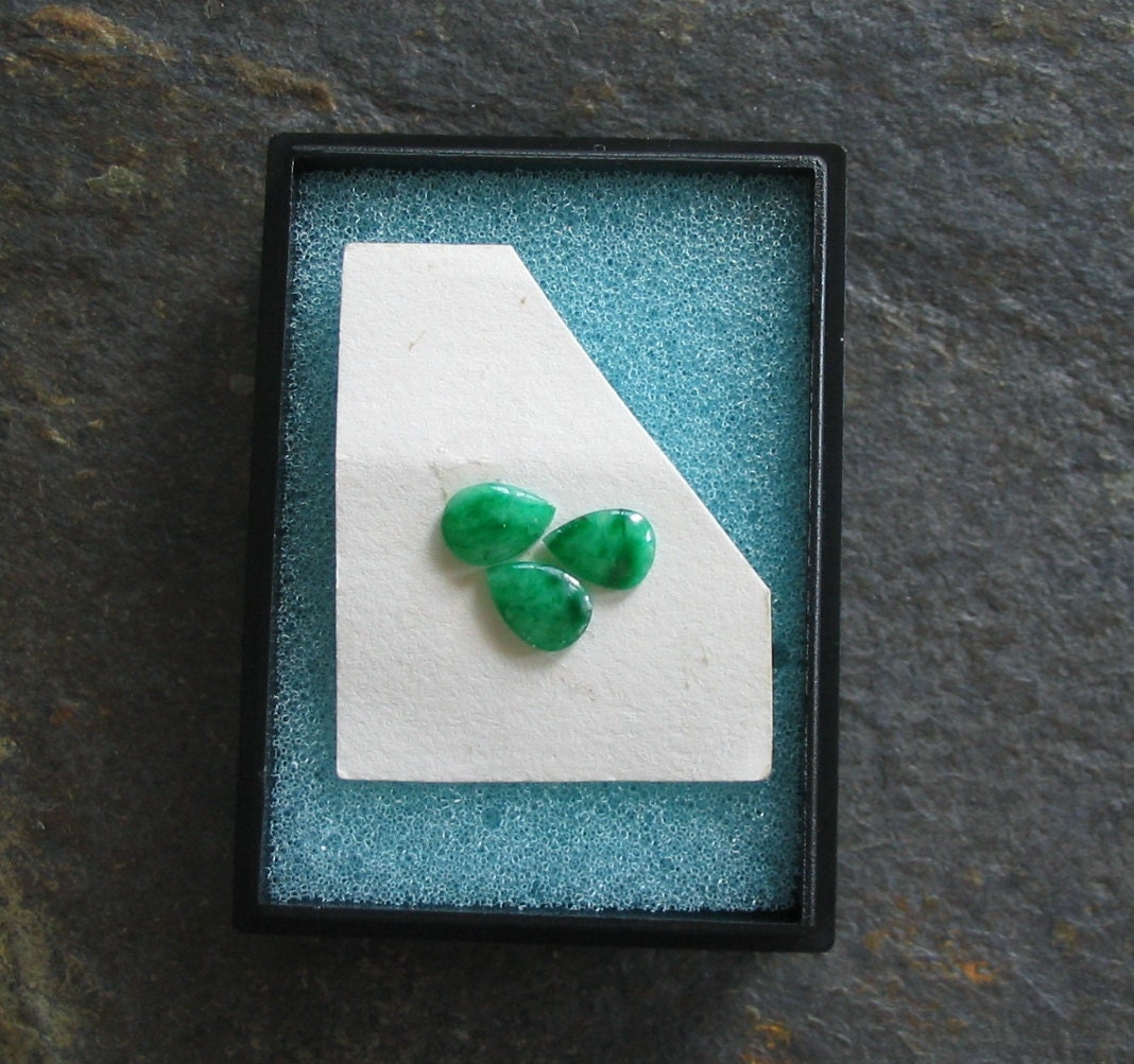 3 oval jade stones