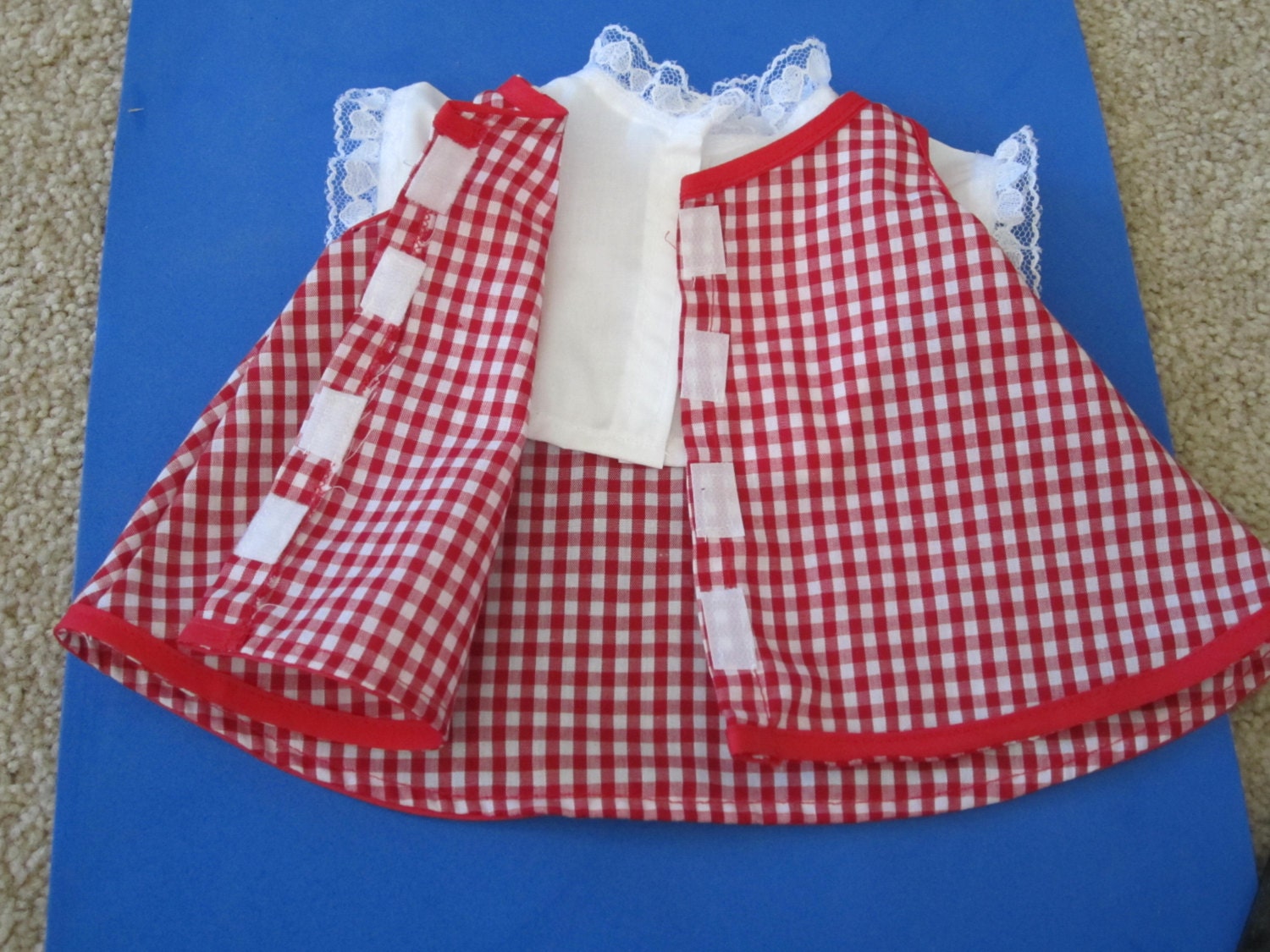 Red checkered Dress With white lace fits standard 18" dolls. (excludes Wal Mart Dolls)