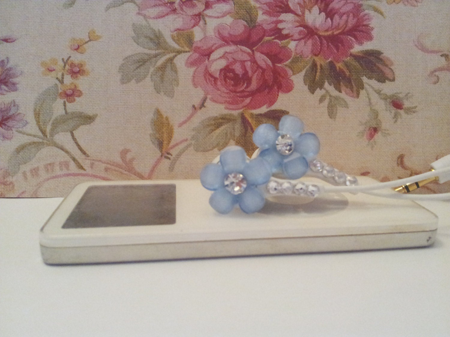 Cute LT Baby Blue frosted Petal flower earbuds with swarovski crystals