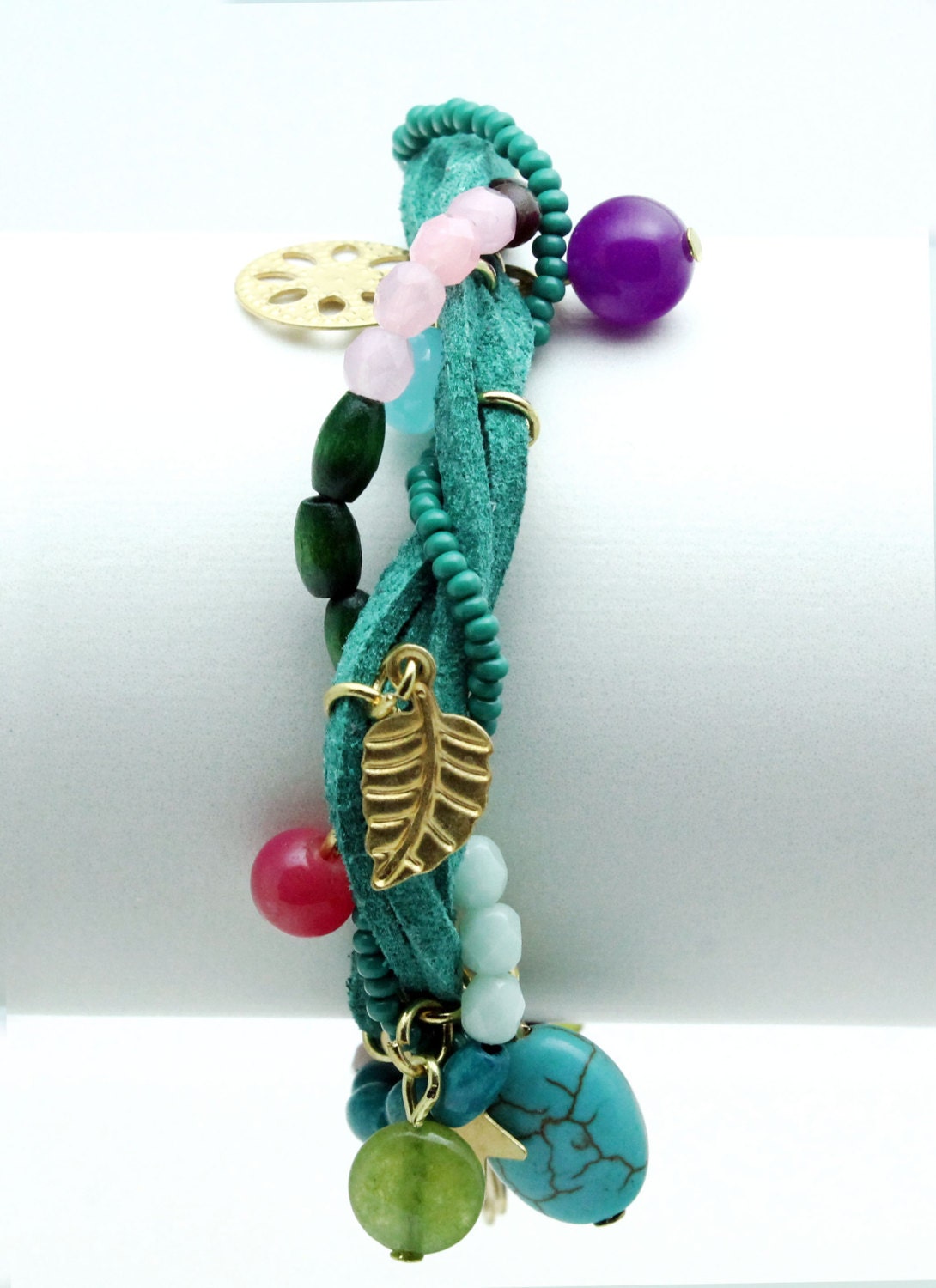 green suede leather,gold plated chain,semiprecious stones and crystals...