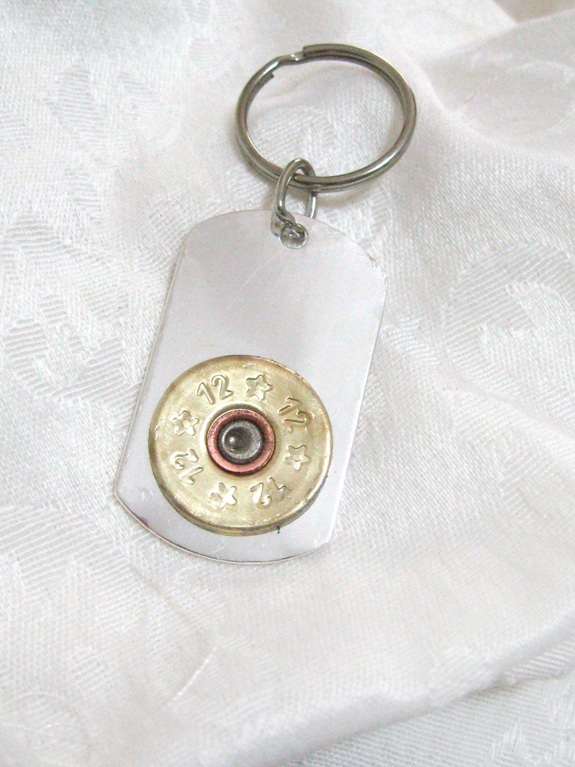 Shotgun 12 gauge keychain - dog tag with brass 12 gauge shotgun shell embellishment with silver toned keyring