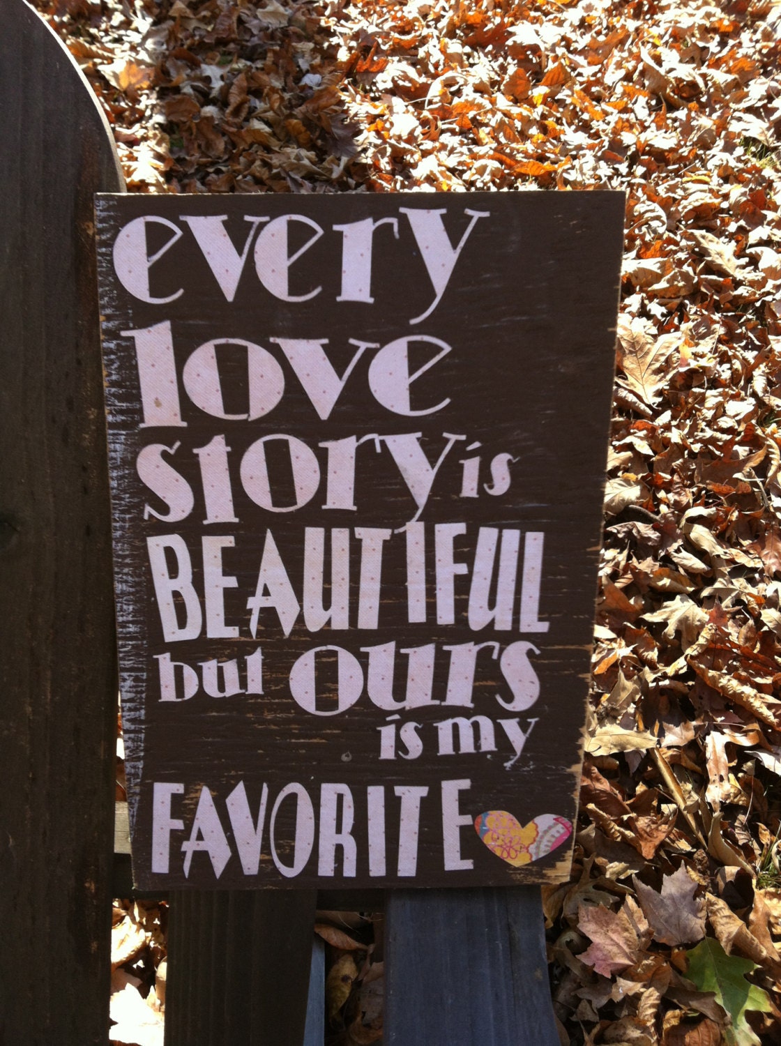 Every love story is beautiful... Handmade wooden sign