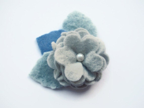 icy floral pin made out of felt and a felted vintage blanket pieces