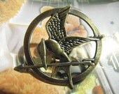 Brooch---brass The Hunger Games Inspired Mockingjay brooch with a pin at the back