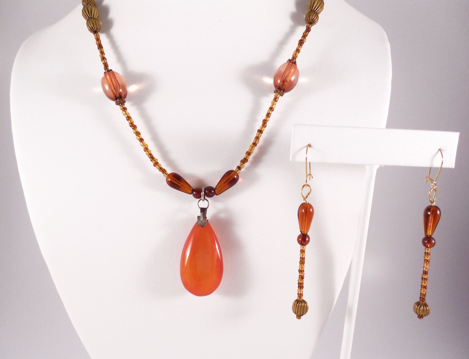 Art deco vintage amber colored handmade beaded pendant necklace with matching earrings, beadwork