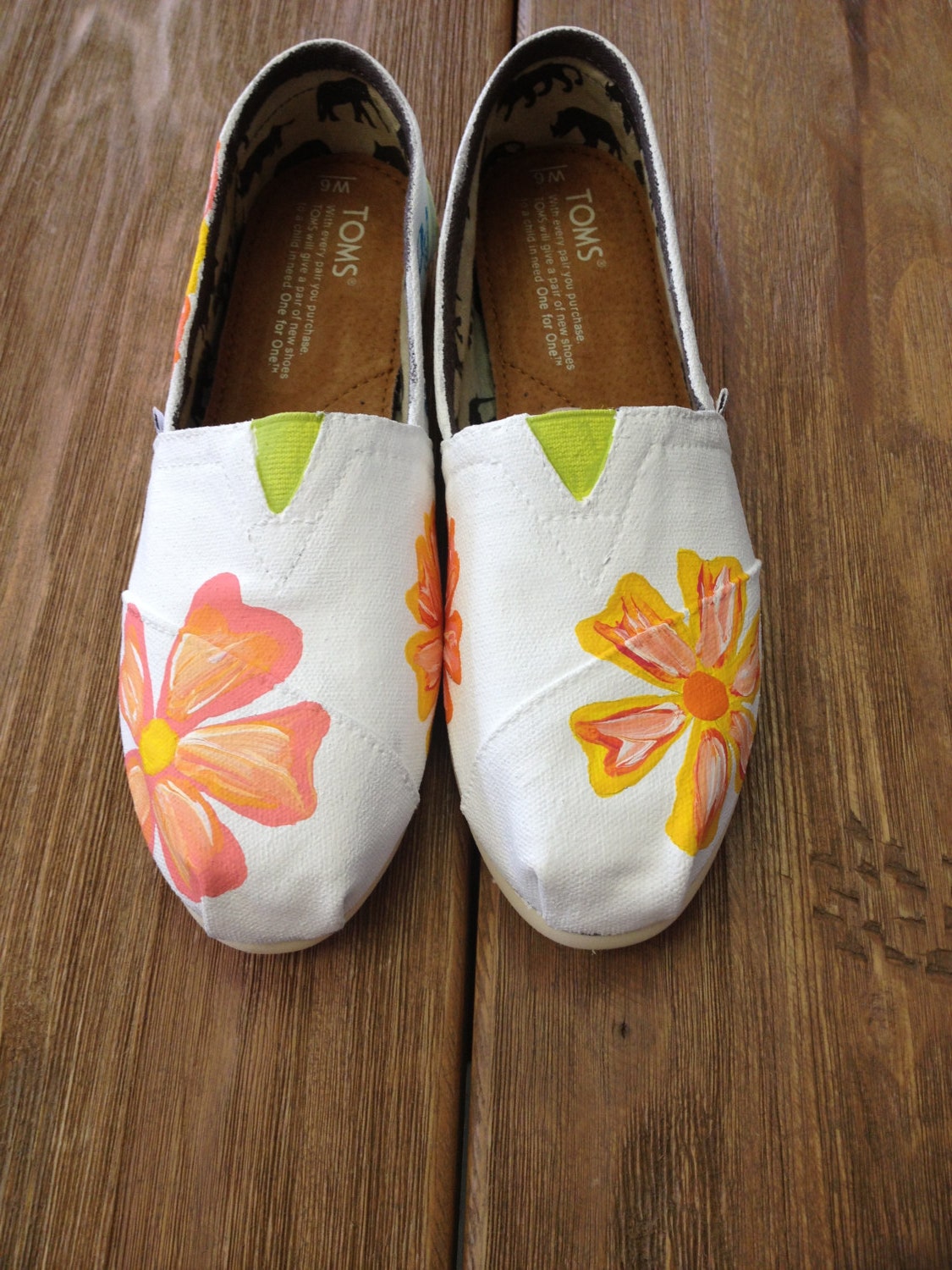 Hand painted, customized flowery TOMS shoes.