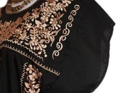 Golden SILK Embroidery in a Black Tunic