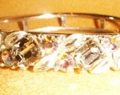 Vintage  fantastic  elegant  avant garde  Lisner cuff bangle bracelet with faux grey topazez  and Swarovski rhinestones circa 1950