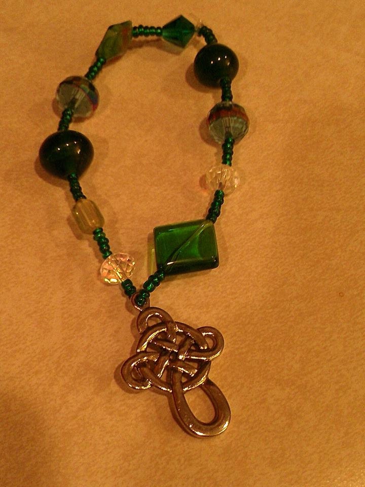 Fun yet Simple Handmade Bracelet using Glass and Acrylic Beads set on Stretch Cord. Green with Celtic Cross