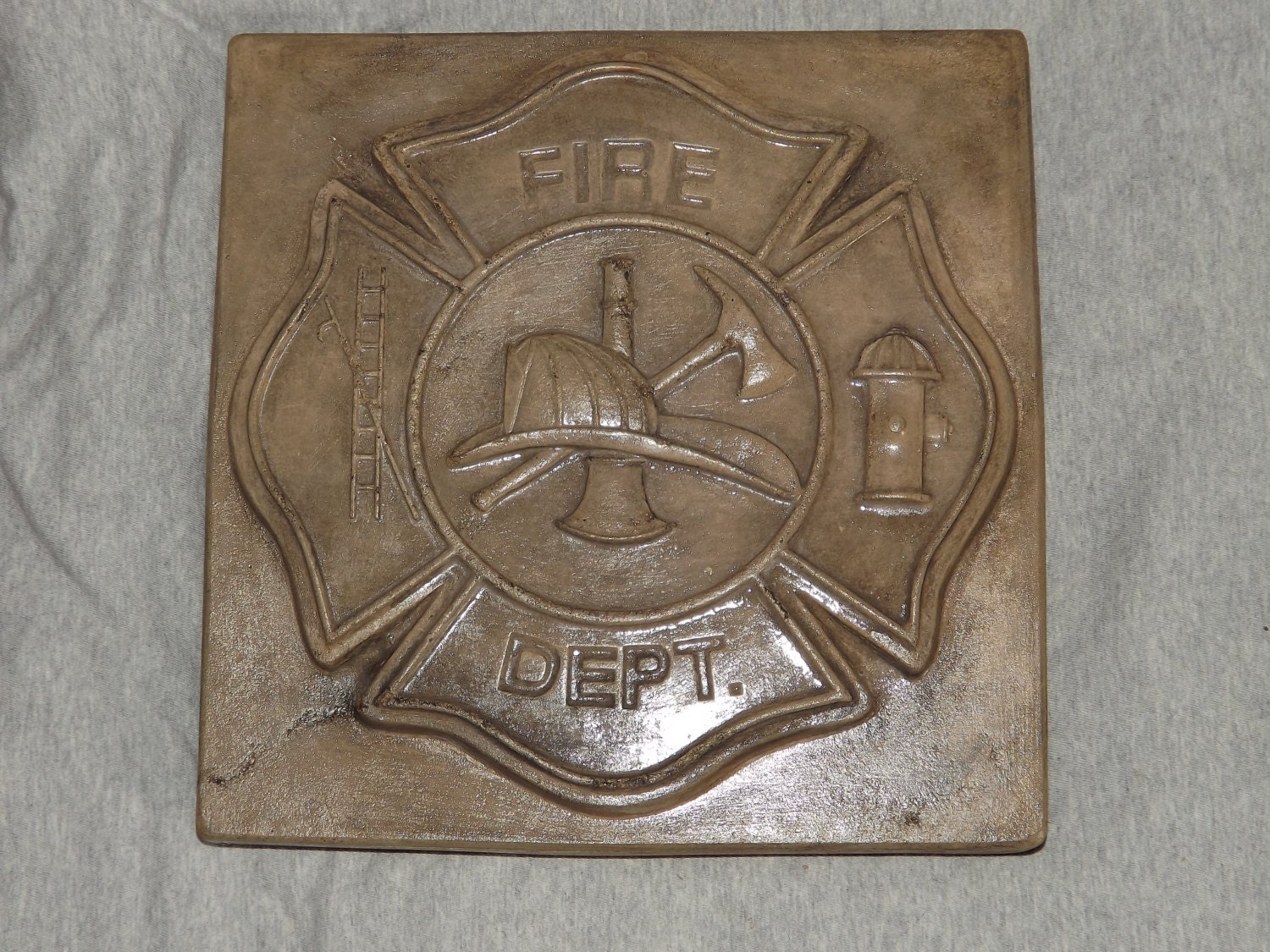 Decorative concrete fire dept. stepping stone
