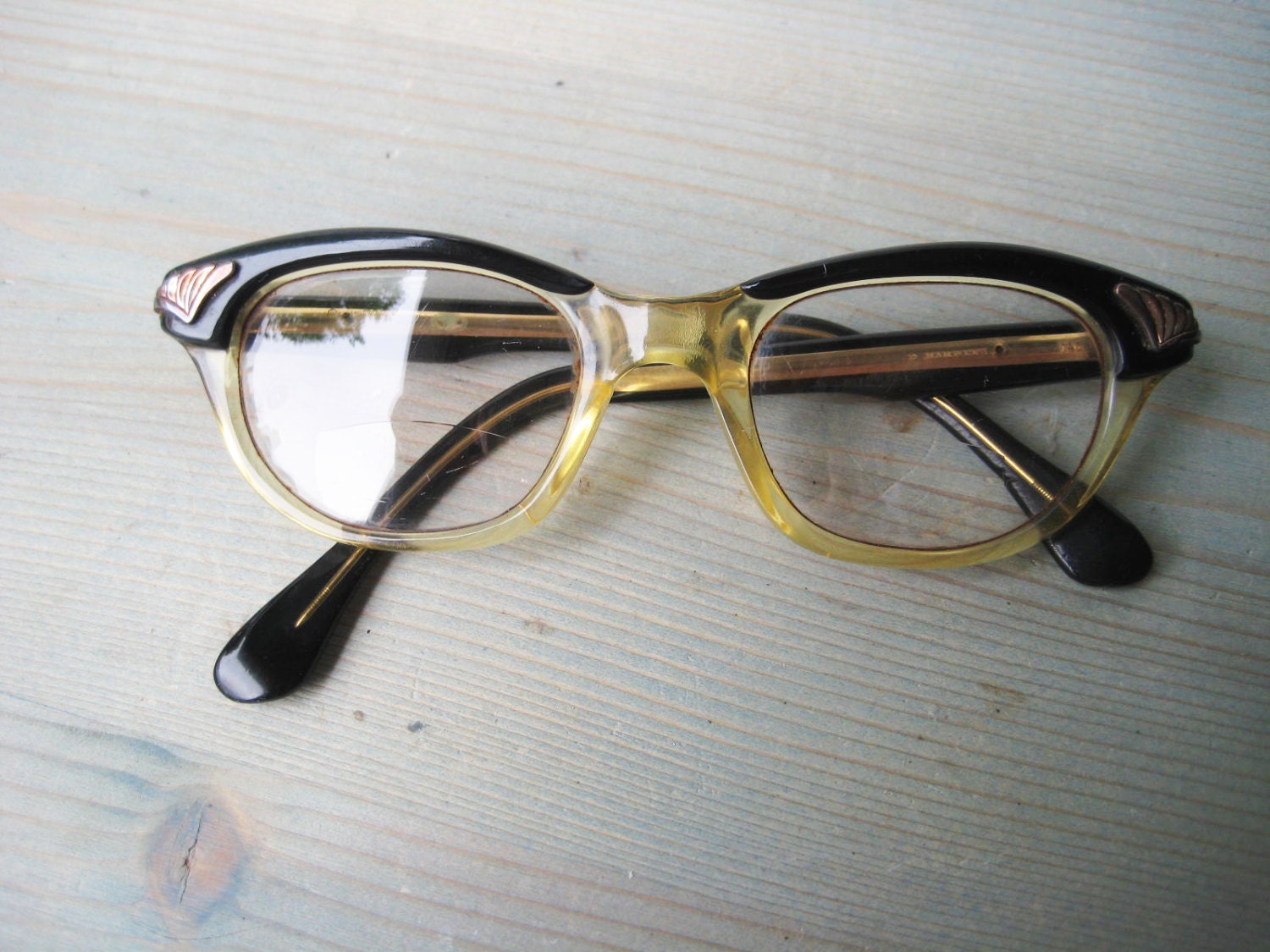 Beautiful 50th cat eye glasses. really nice brass colored elements. vintage eyewear for Hipster. Festival summer is coming