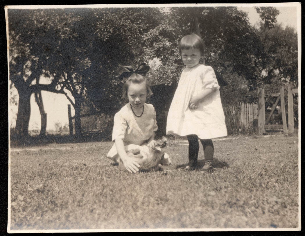 Vintage photo Little Girls picking clover