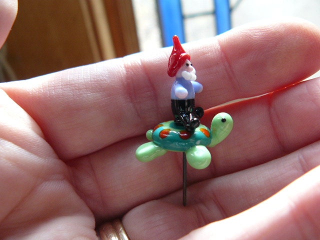 Fairy garden accessory - gnome riding a turtle