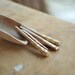 4 Long oak wood beads/ sticks - Ethnic touch with gold leaf