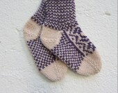 Handknitted socks with norwegian pattern in wool