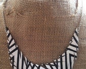 Black and white stripe print single recycled leather feather necklace