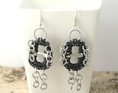 black pop tab guy earrings - pair - crochet