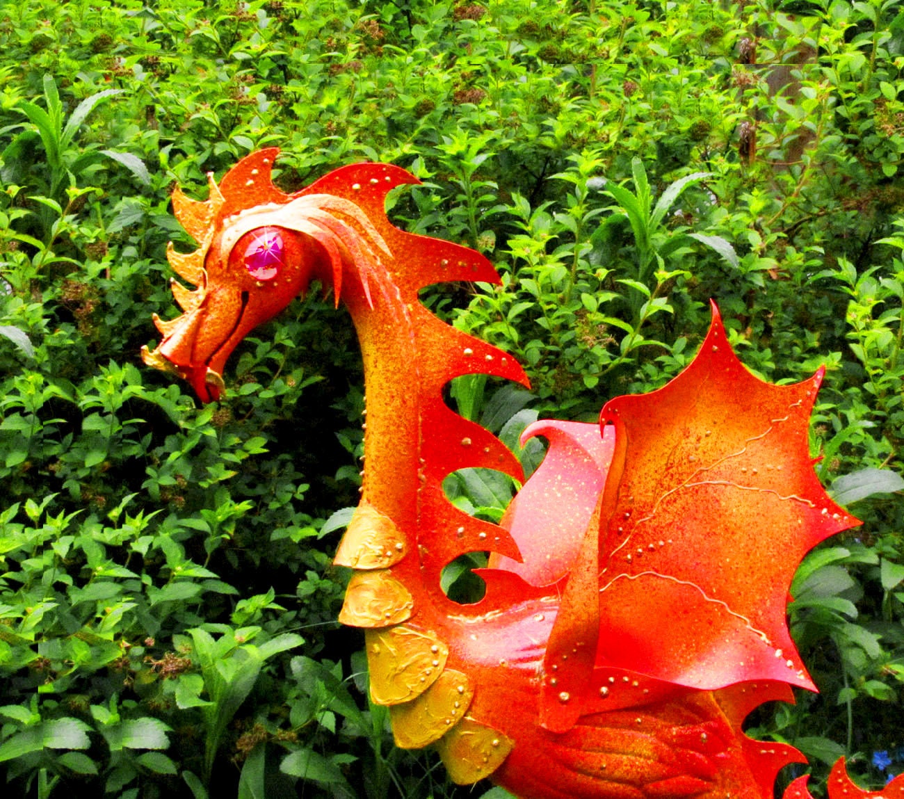 Fire Dragon Flamingo  - handmade, garden art sculpture created from a recycled plastic flamingo.