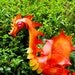 Fire Dragon Flamingo  - handmade, garden art sculpture created from a recycled plastic flamingo.