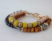 Panaji Bracelet - statement yellow, orange, peach bracelet with pyrite and garnet beads