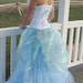 The Secret Boutique White & Blue Irridescent Bustle Gown