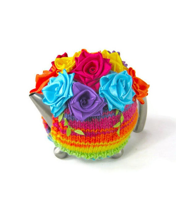 Rainbow teapot cozy bright colour floral knitted tea cosy adorned with an array of multicolour ribbon roses