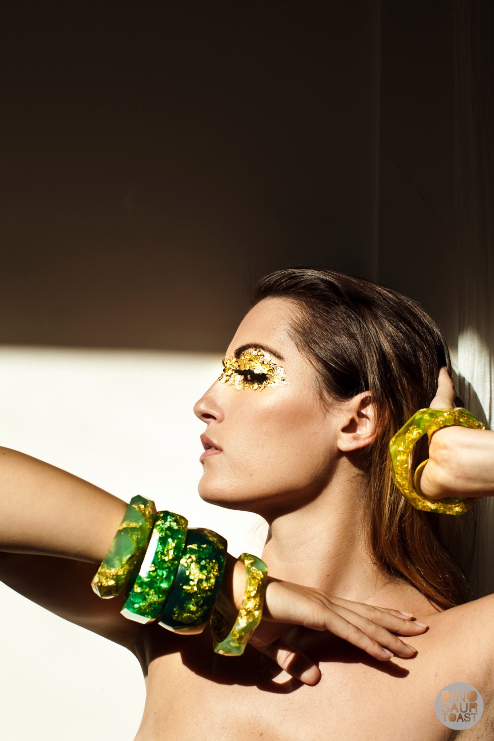 emerald green resin round bangle made with eco resin containing metallic gold leaf foil