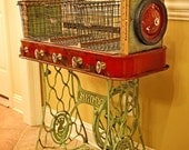 Repurposed Red Rider Wagon Sewing Machine Iron Base Wire Gym Baskets Yardstick Table of Recycled Found Industrial Objects