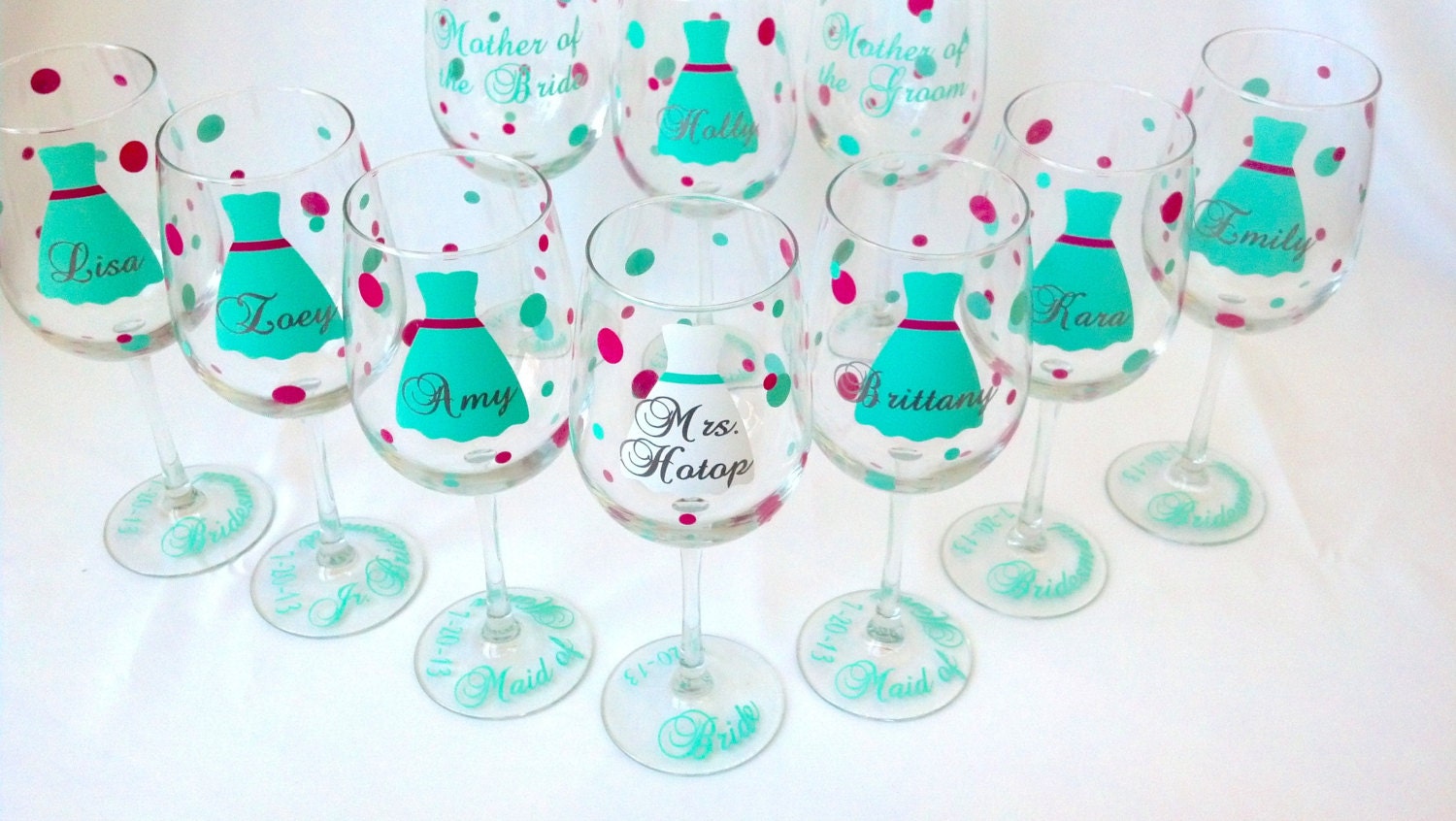 9 bridesmaids glasses, wine glasses with dress, polka dots, name, title and date. Personalized bridesmaid gift