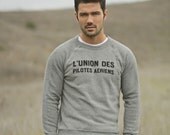 Gray sweathshirt for men and women by We Are All Smith. Aviation graphic.