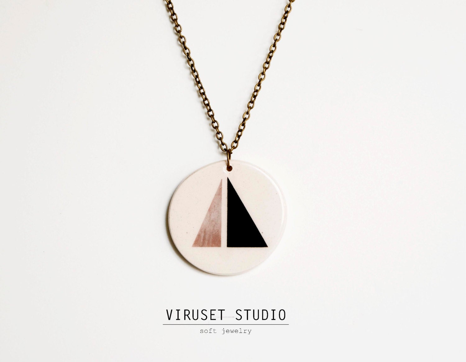 Geometric ceramic necklace black and pale rose, pendant inspired by Scandinavian design completely handmade. Viruset Studio