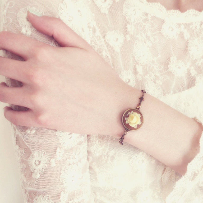 Rose Cameo bracelet with antiqued bronze tone chain of crosses . Lola