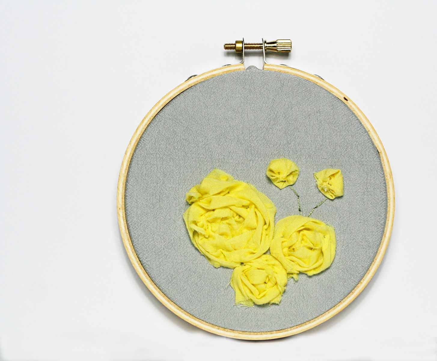 Grey embroidery hoop artwork / cottage style home decor / yellow fabric flowers / 4 inch size / spring flowers
