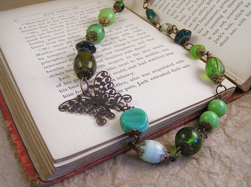 Green glass butterfly necklace with butterfly filigree charm. Victorian style handmade jewelry