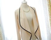 women draped cropped jacket beige black trim cardigan celebrities style